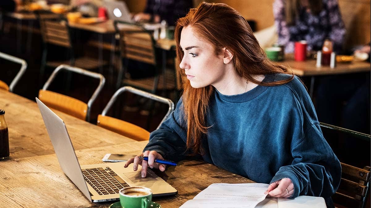 Woman in cafe on her laptop